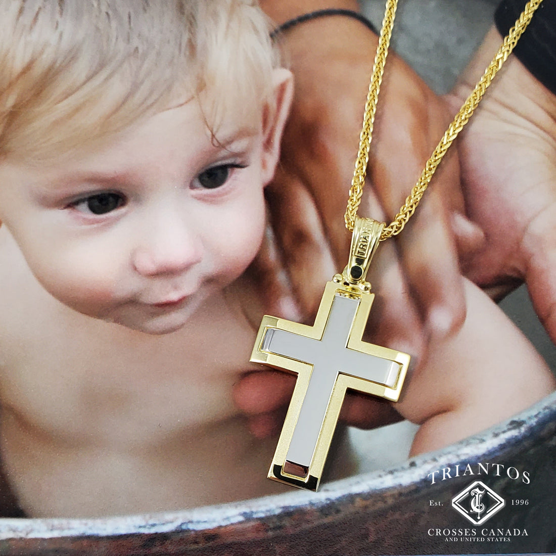 a photo of a baby boy being baptized and a Triantos Cross overlaid on top of the picture 