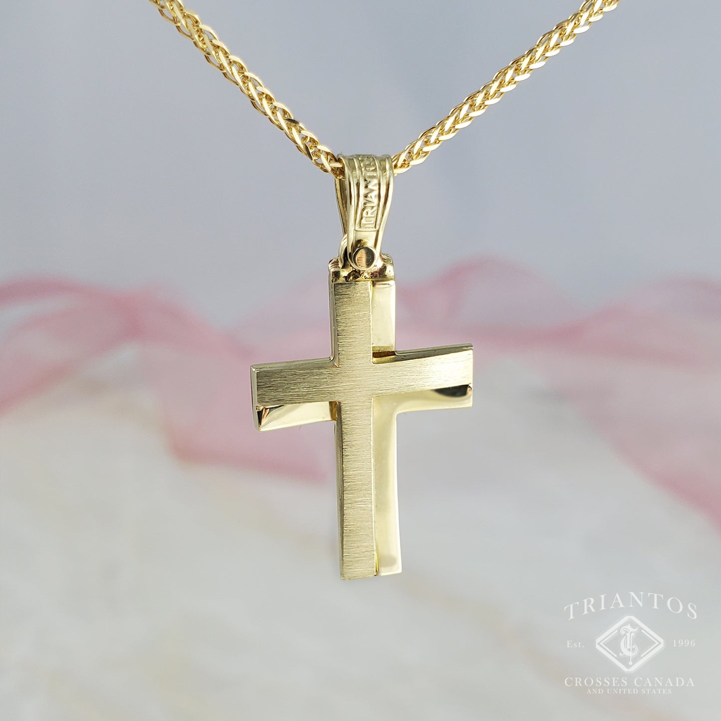 Triantos Yellow Gold Cross suspended on a chain