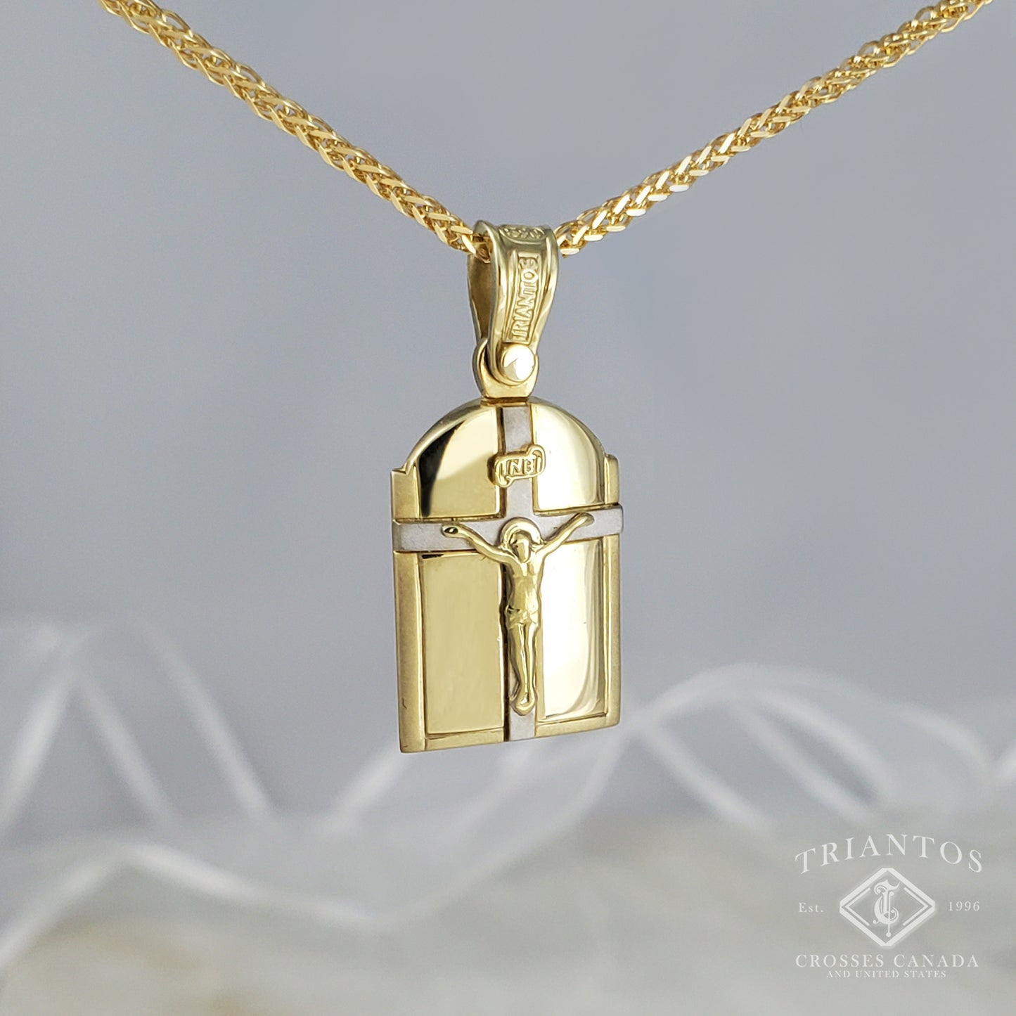 Triantos Framed gold Jesus Christ Medallion Pendant Necklace suspended on a white gold chain